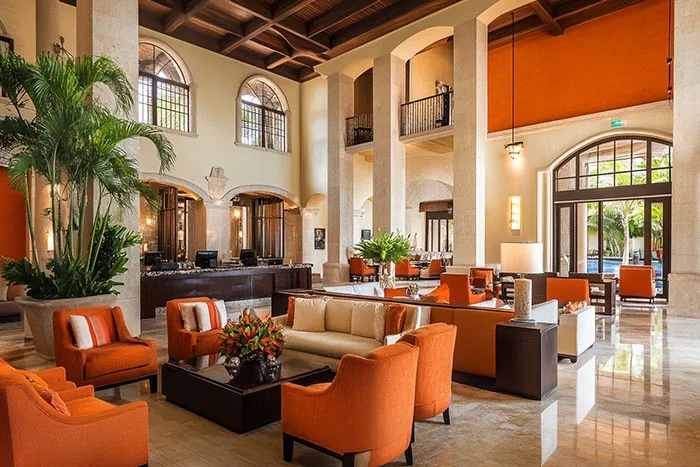 GEORGE Group hospitality lobby with sofas, lounge chairs and tables