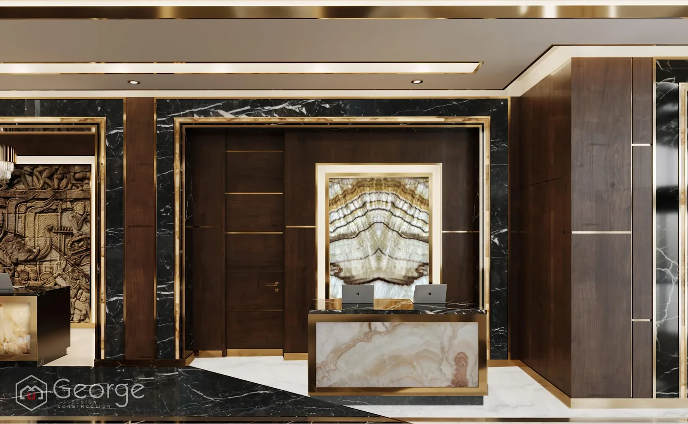GEORGE Group hospitality reference with a formal reception counter, stone feature panel and adjacent joinery